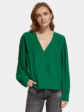 Long sleeved v-neck blouse Long sleeved v-neck blouse